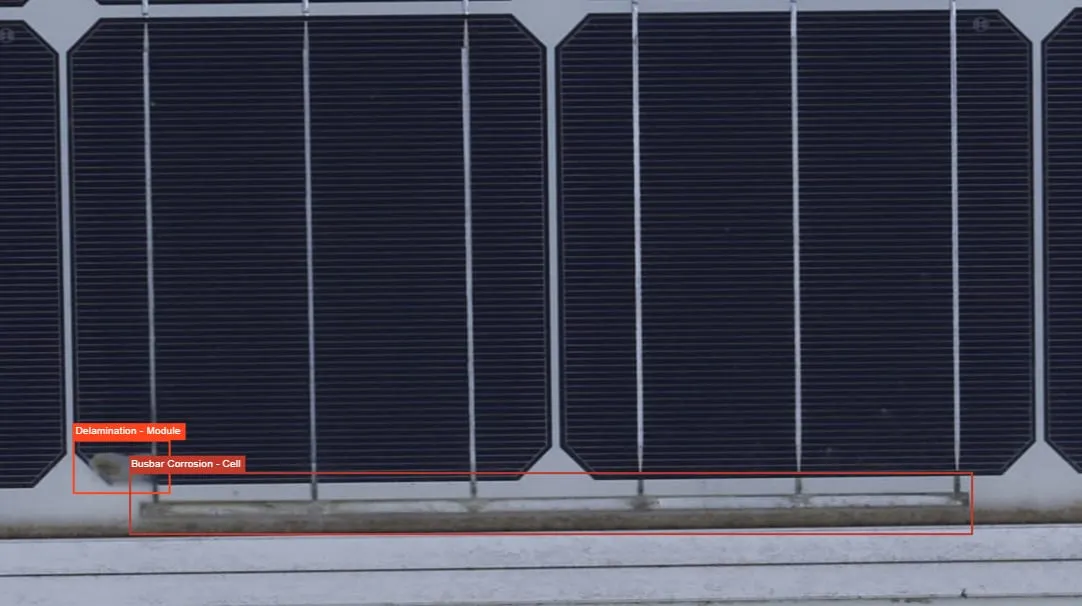 Both busbar corrosion and delamination visible on solar panel